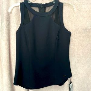 New with tag shirt, Black sleeveless, zipper up back side.